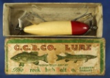 Vintage fishing lure: Creek Chub Wounded Minnow in box.