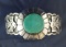 Ornately styled vintage antique silver and turquoise Navajo bracelet and nice condition.