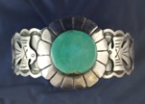 Ornately styled vintage antique silver and turquoise Navajo bracelet and nice condition.