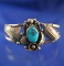 Antique Southwestern Bracelet with Turquoise Insert.
