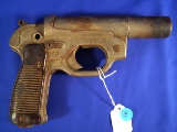 Vintage Flare Gun- grip on one side is damaged.