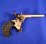 Starter Pistol .17mm, damage to one grip. Barrel is drilled and plugged.