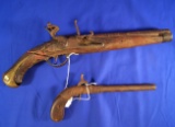 Flint Lock Military style pistol in rough conditon and a percussion boot pistol.