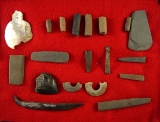 Group of Stone and Shell artifacts, including pendant pieces, beads, and broken bases of pipes.