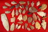 Large group of assorted Midwestern arrowheads and knives, largest is 4 5/16