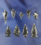 Set of nine assorted obsidian arrowheads, largest is 1 3/16