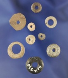 Set of nine stone rings and beads including one found by Charlie Mitchell near the Mabee site.