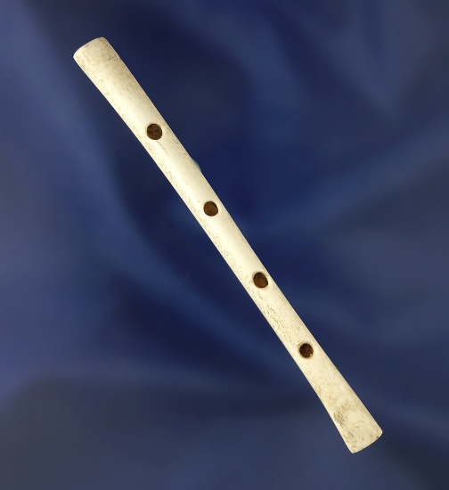 3 3/8" four-hole Bone Flute found in Kentucky.