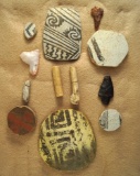 Unique set of artifacts including arrowheads, salvage pottery discs and bone relics- Arizona.