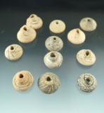 Set of 12 Aztec spindle worlds made from fired clay found in central Mexico.