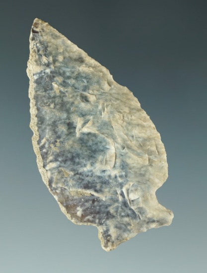 Heavily patinated 2 1/16" Knife River Flint point found in the Dakotas.