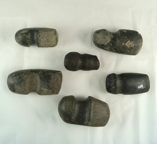 Set of six Southwestern U.S. axes which were converted into (and used as) hammerstones.