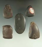 Set of four Hematite Celts in a partially drilled Pebble Pendant found at Brown's island.