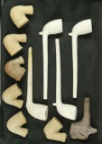 Excellent set of 11 old clay trade pipes.