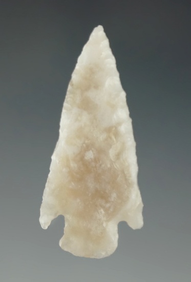 1 3/8" Mummy Cave point found in the Great Basin area made from  semi-translucent material.