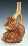 Moche fertility bottle depicting two animals copulating. Possibly a jaguar and a frog?