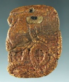 Chavin culture carved bone face with an inlaid eye found in Peru. Circa 1000 BC.