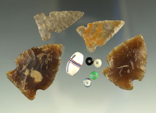 Set of four  arrowheads and some trade beads all found in South Dakota. Largest is 1 5/16".