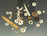 Group of assorted stone, shall and bone beads and ornaments found near the Columbia River.