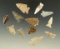 Set of 12 assorted arrowheads made from various materials all found in Kansas.