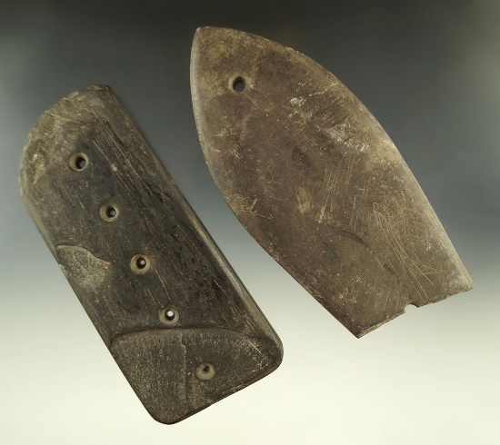 Unique set of slate artifacts including a 5 3/4" damaged coffin style gorget and a drilled tablet.