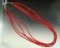 Very large strand  necklace  of contemporary red beads.