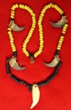 Historic/contemporary Beaded Necklace with bear tooth and bear claws.
