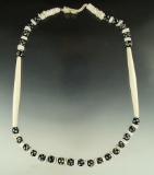 Beaded necklace assembled from shell and trade beads found near the Dalles, Oregon.