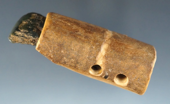 Jadeite Blade that is 1 1/2" long set into a 2 1/2" bone handle found in Alaska.