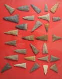 Framed group of approximately 29 Mississippian triangle arrowheads - Midwestern U. S.