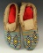 Pair of Blue and Yellow 20th Century Fancy Dance Sioux Moccasins.