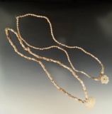 Pair of snail shell bead necklaces found in Arizona. Each strand is aproximately 19