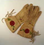 Pair of Beaded Leather Gauntlets with a floral pattern.