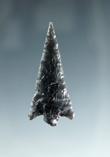 1 5/8" obsidian cornernotch point with nice flaking found in Oregon.