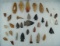 Set of approximately 35 assorted arrowheads found in various locations, largest is 2 3/4