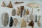 Group of assorted tools including drills, knives, and a Flint Celt. Largest is 4