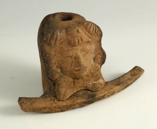 5" wide by 3 1/8" tall pre-Columbian face effigy pottery handle found in Mesoamerica.