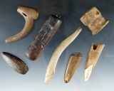 Set of seven bone artifacts found in Alaska, largest is 4 1/8