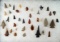 Group of assorted arrowheads from the High Plains region, largest is 2 3/16