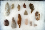 Group of 13 assorted flaked artifacts found in the Plains region. Largest is 3 5/eighths