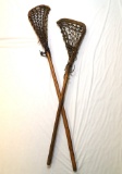 Pair of Iroquois Lacrosse Sticks from Western New York State, late 19th century. Made from hickory.