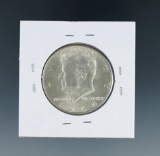 1964-D over D Kennedy Silver Half Dollar AU