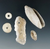 Group of drilled shell and Shell disc beads found near the Columbia River. Ex. Leon Wiley.