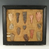 Old framed group of 13 assorted arrowheads found in Ohio.