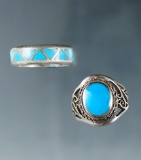 Pair of silver and turquoise vintage rings.