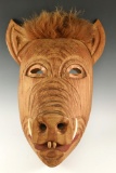 Nicely styled wood wild boar mask with copper eyesockets and curved bone tusks. Nice display item!