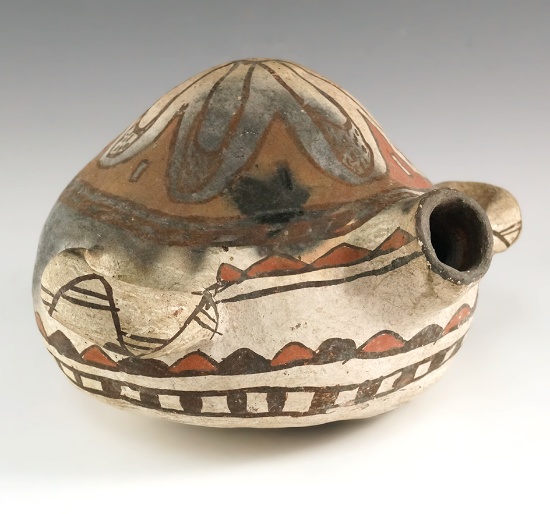 Beautifully decorated 9 1/4" wide Zuni Pueblo canteen from New Mexico.