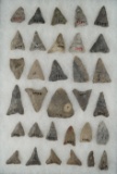Group of 32 Mississippian Triangle points, largest is 1 7/8