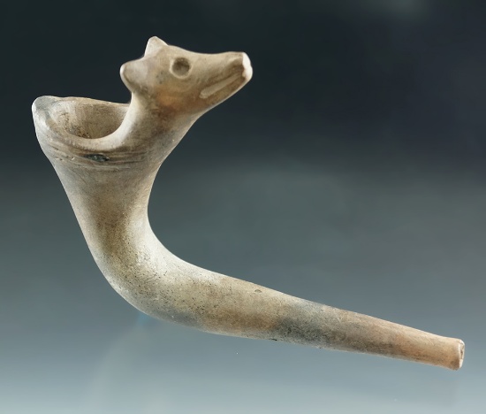 5 3/4" Wolf effigy clay pipe with partial restoration to the bowl, tip of one ear.  New York.