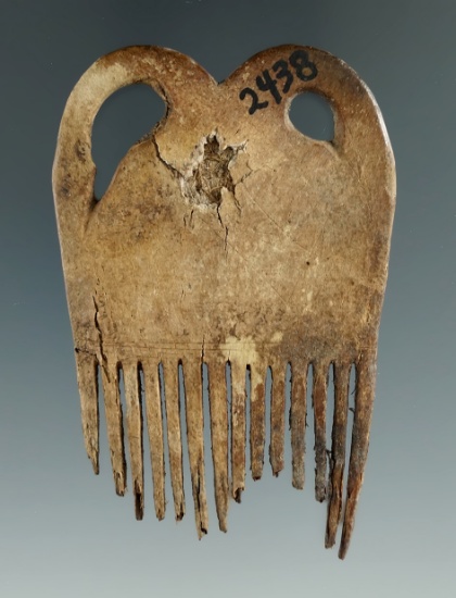 Rare! 3 13/16" bone comb found in New York. Decent condition considering its age.